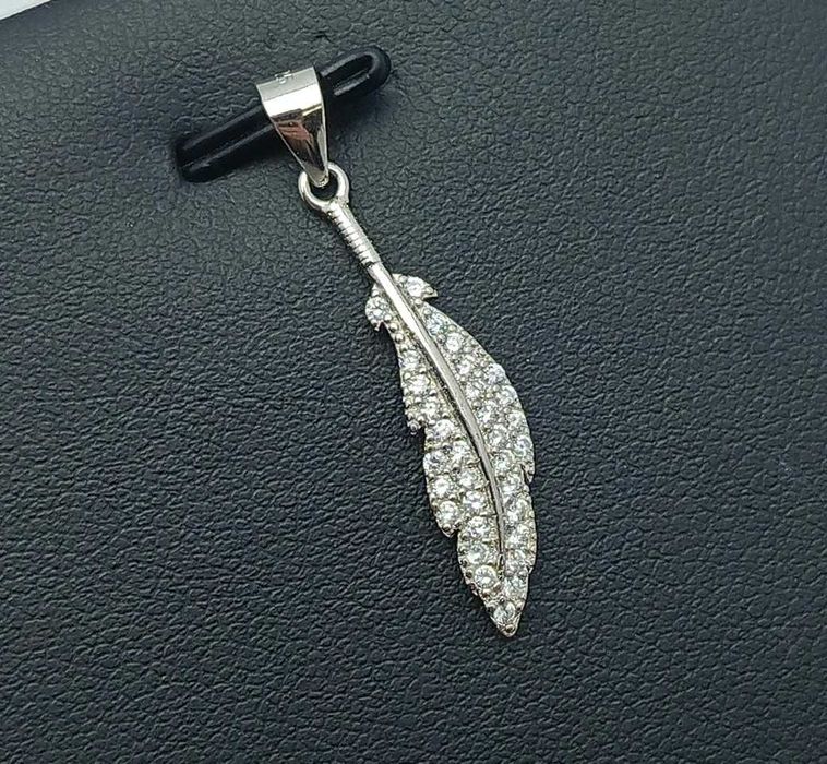 Urocza Srebrna Zawieszka Piórko 1,11g p925