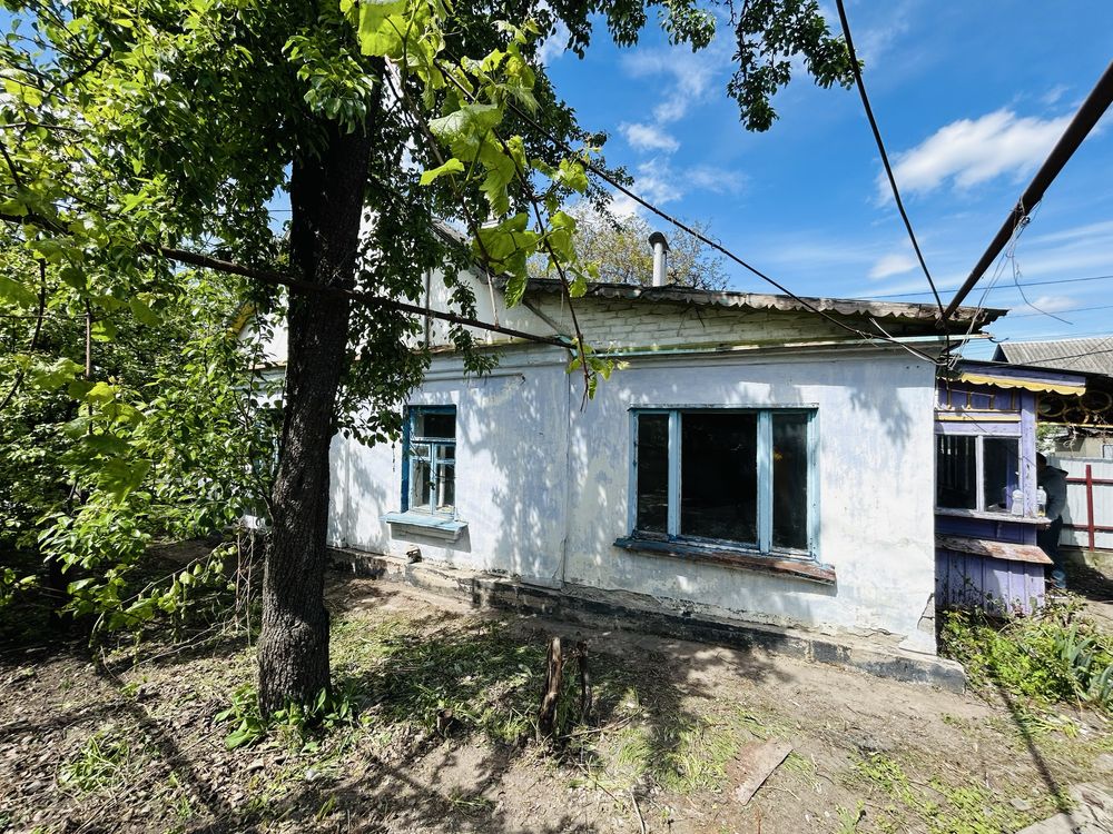 Продаж частини будинку в гарному місці під ремонт
