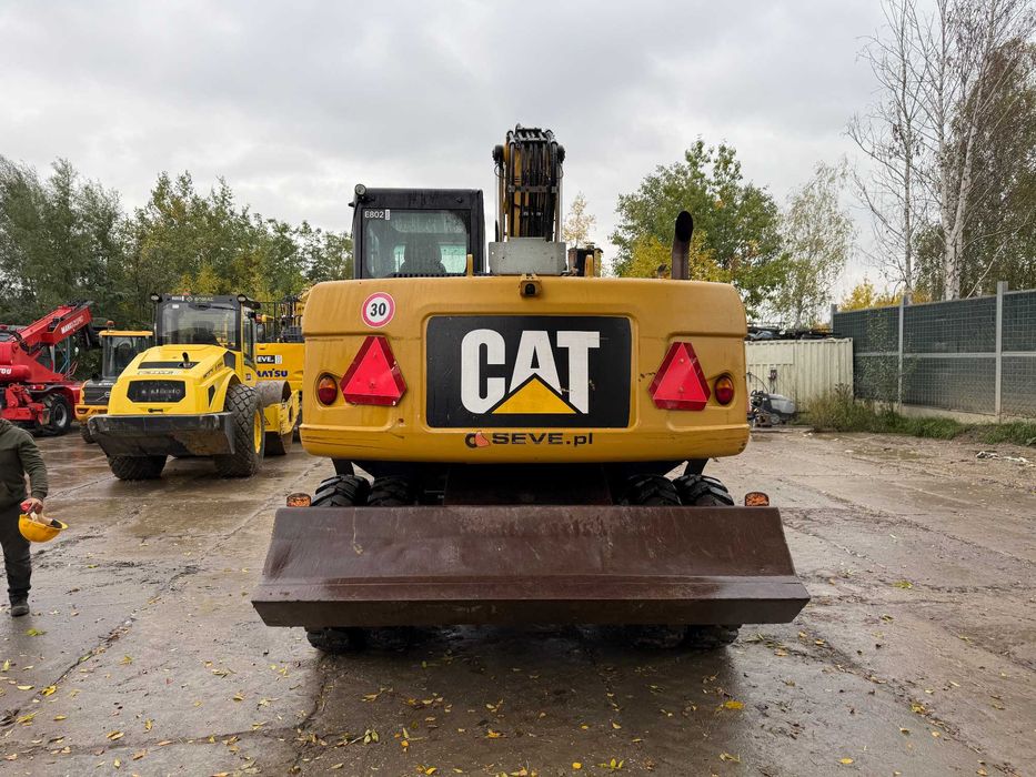 Caterpillar Cat M 313 D koparka kołowa 14 t głowica uchylna Powertilt