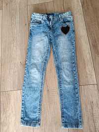 Spodnie jeansowe dla dziewczynki 128r.