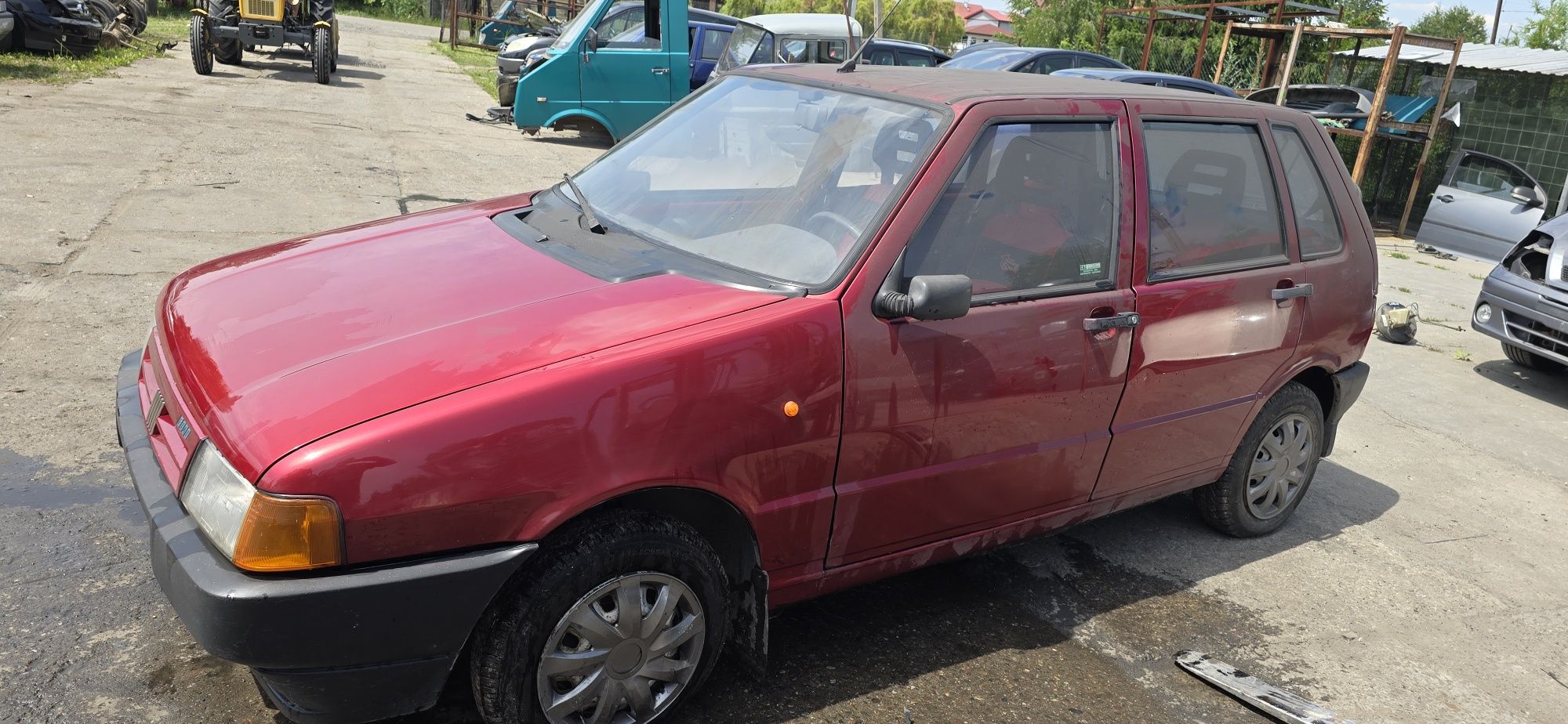 Drzwi maska klapa  zderzak lampa silnik 0.9 Fiat  Uno części
