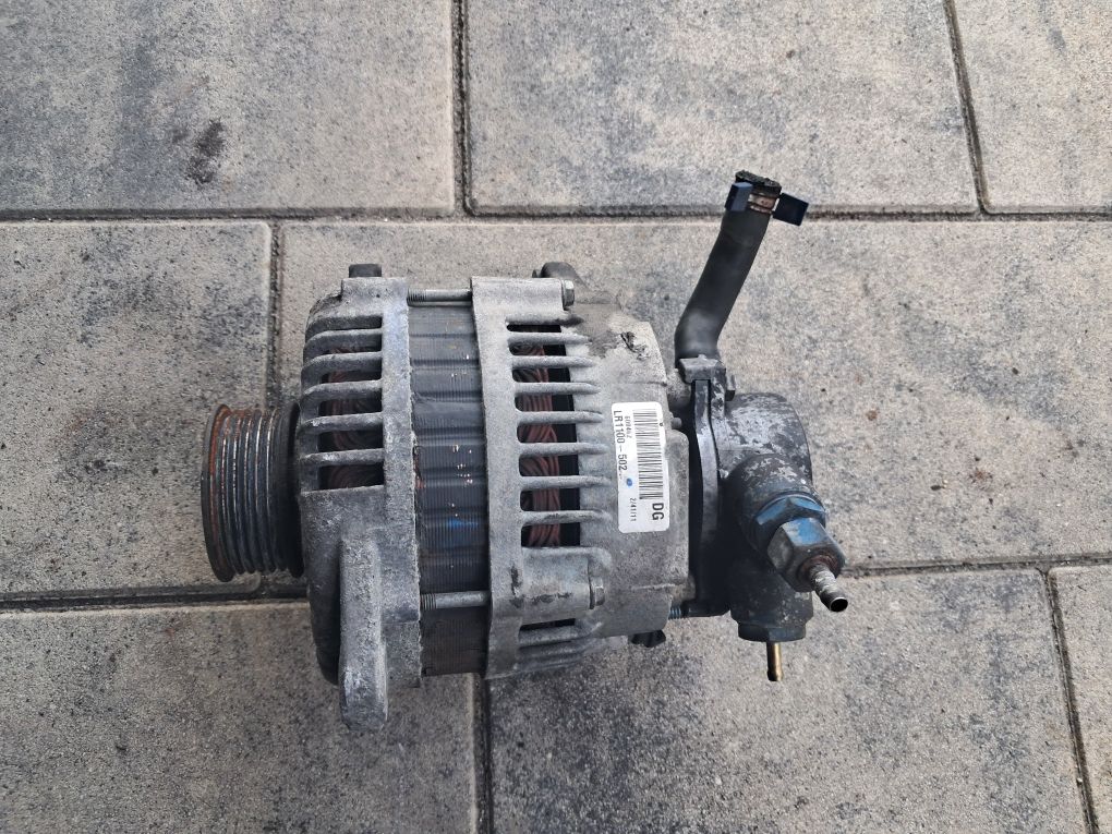 Alternator z Vacum pompą Opel Corsa C Diesel 1.7 DTI Rok 2003