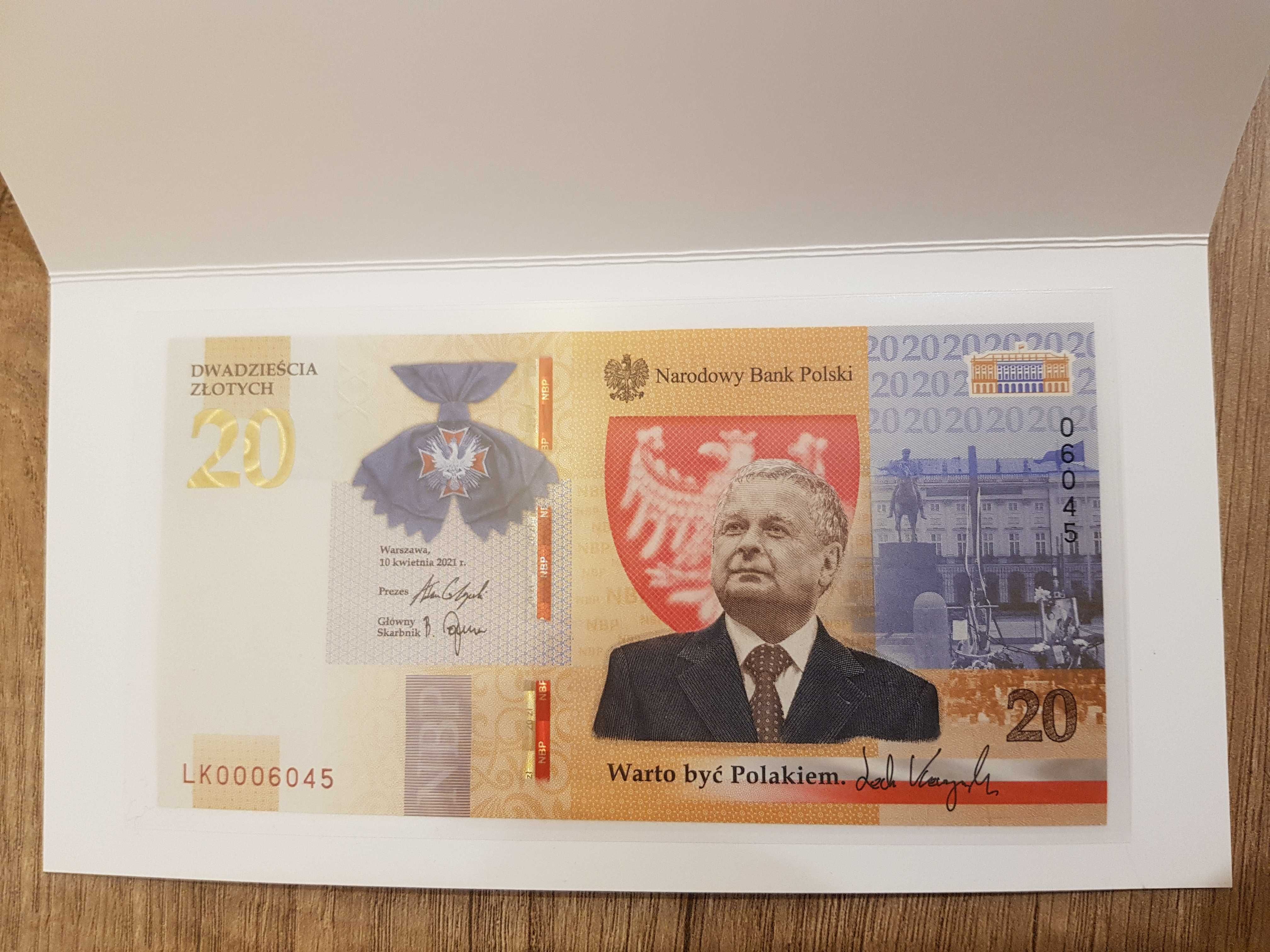Banknot 20zł Lech Kaczyński "warto być Polakiem" + folder -NISKI NUMER