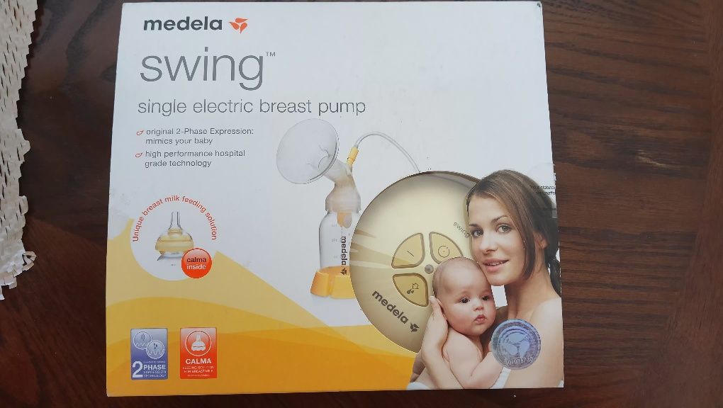 Medela електричний молоковідсмоктувач, молокоотсос