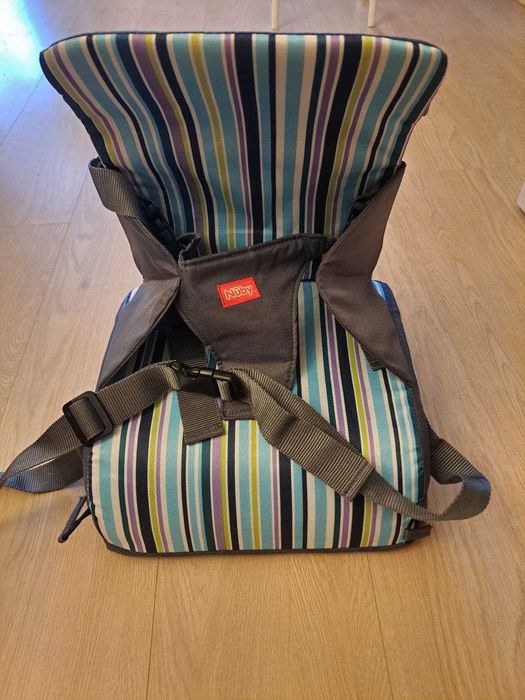 Бустер Nuby дитяче кріселко для подорожей