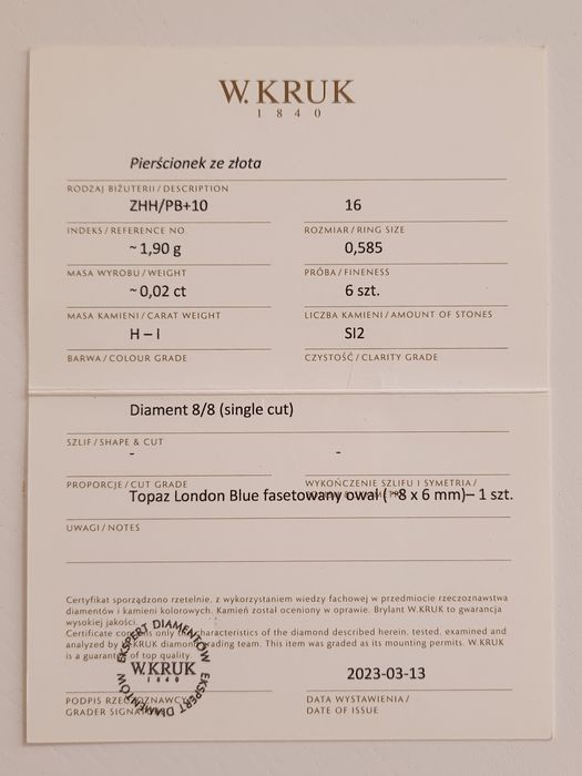W. Kruk złoty pierścionek z topazem i diamentami r. 16