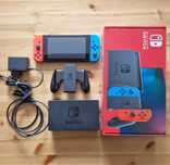 Nintendo Switch + 8 gier + etui - stan bdb