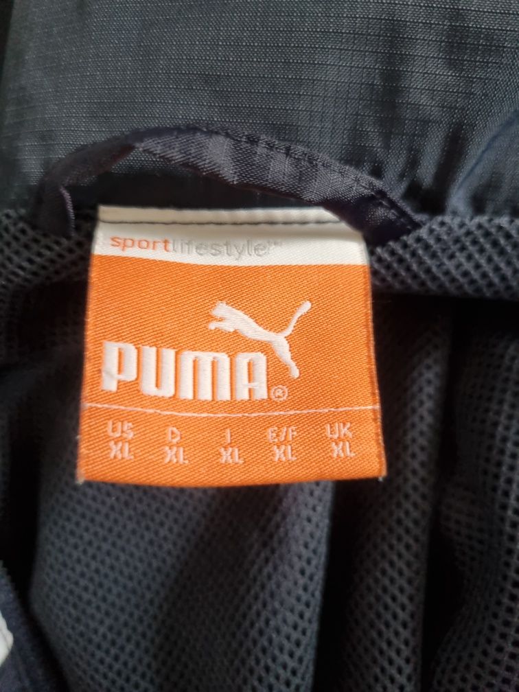 Kurtka Puma Spirit Rain Jacket. Wiatrówka przeciwdeszczowa ortalionowa