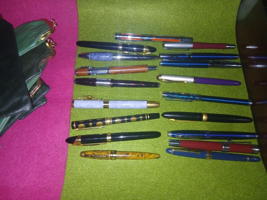 Lote de 32 caneta e 32 bolsa pele