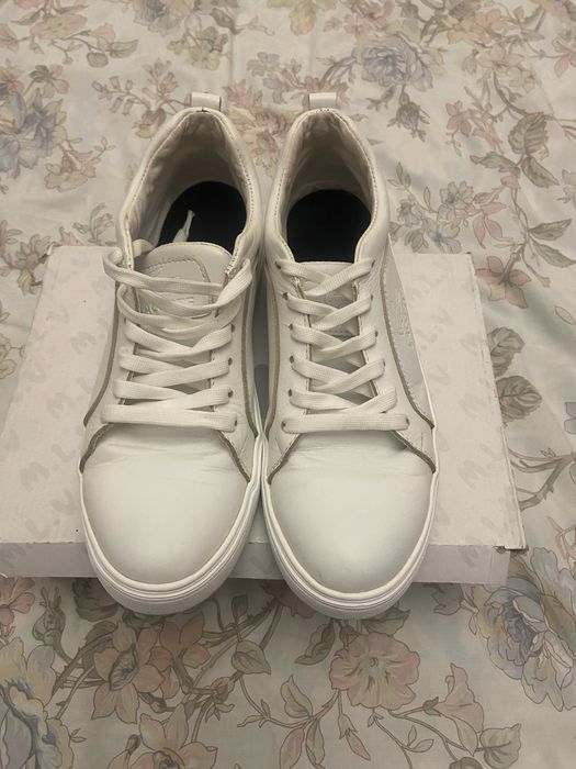 Шкіряне чоловіче взуття Lacoste