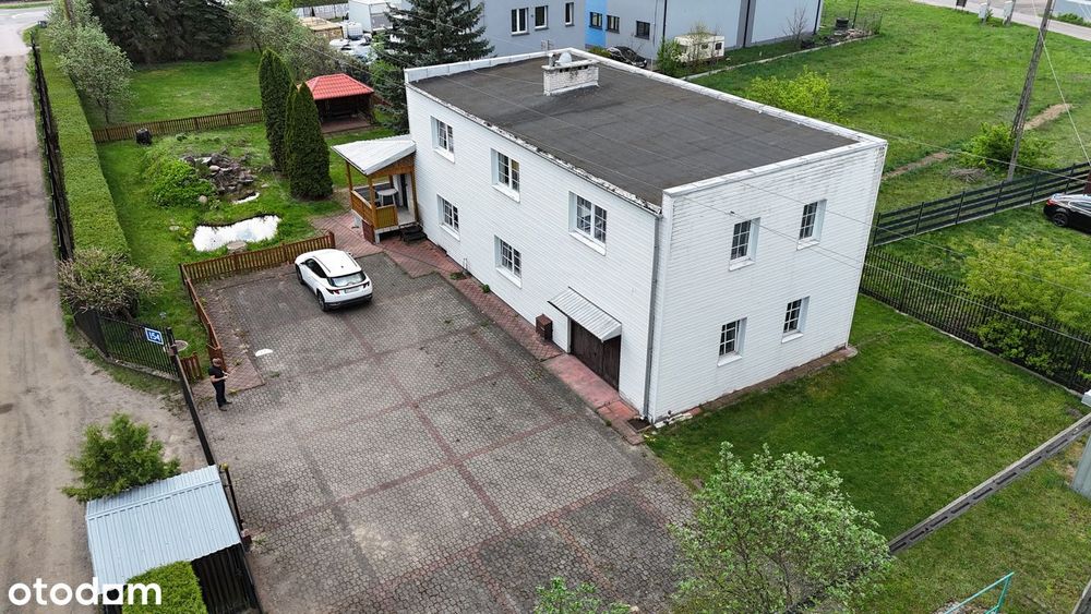 Dom mieszk.+możl.działn.gosp.-przy drodze krajow.:W-wa-Mińsk;dz.2061m2