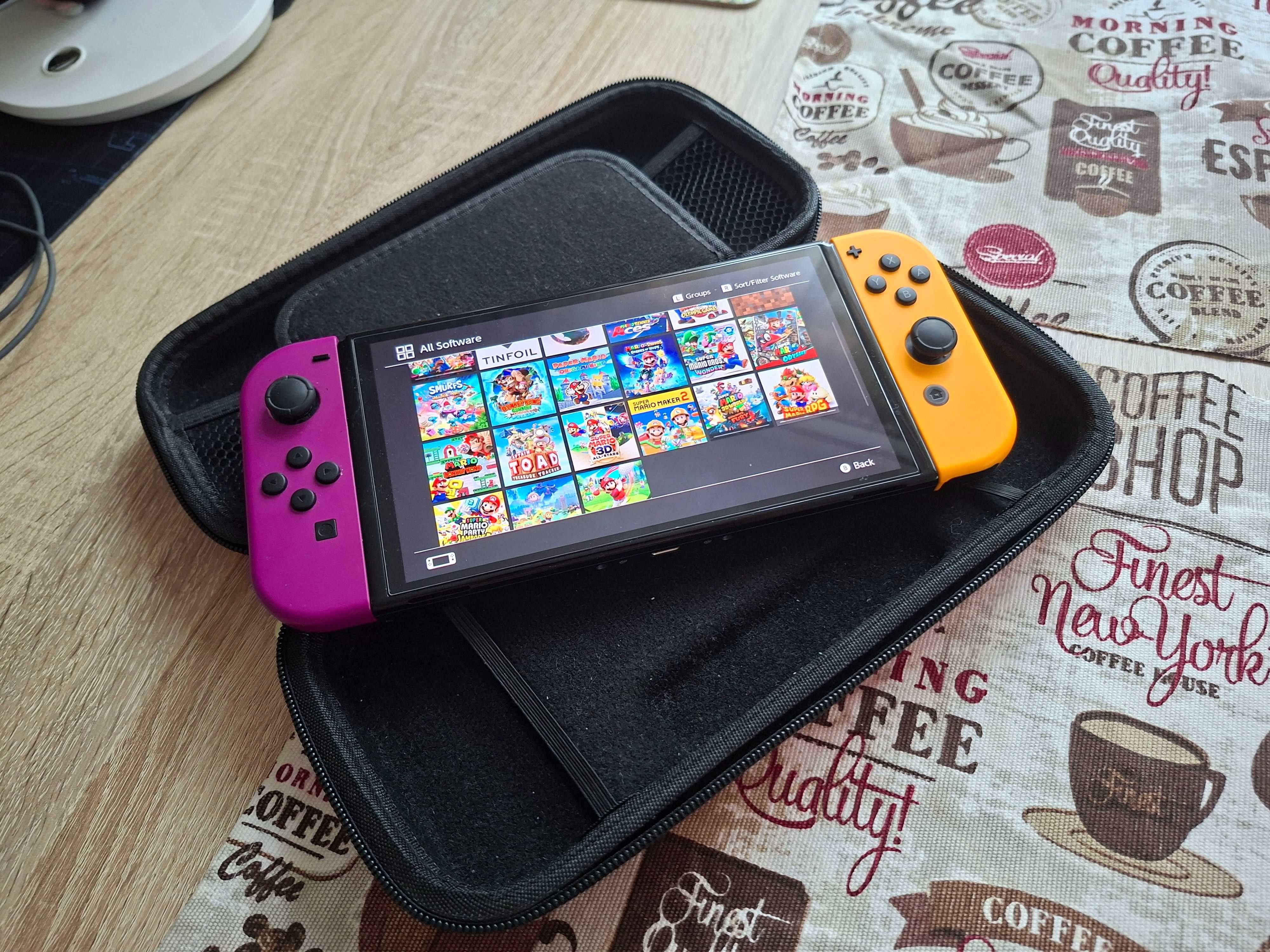 Nintendo switch oled wypasisona z mnistwem gier zamienię
