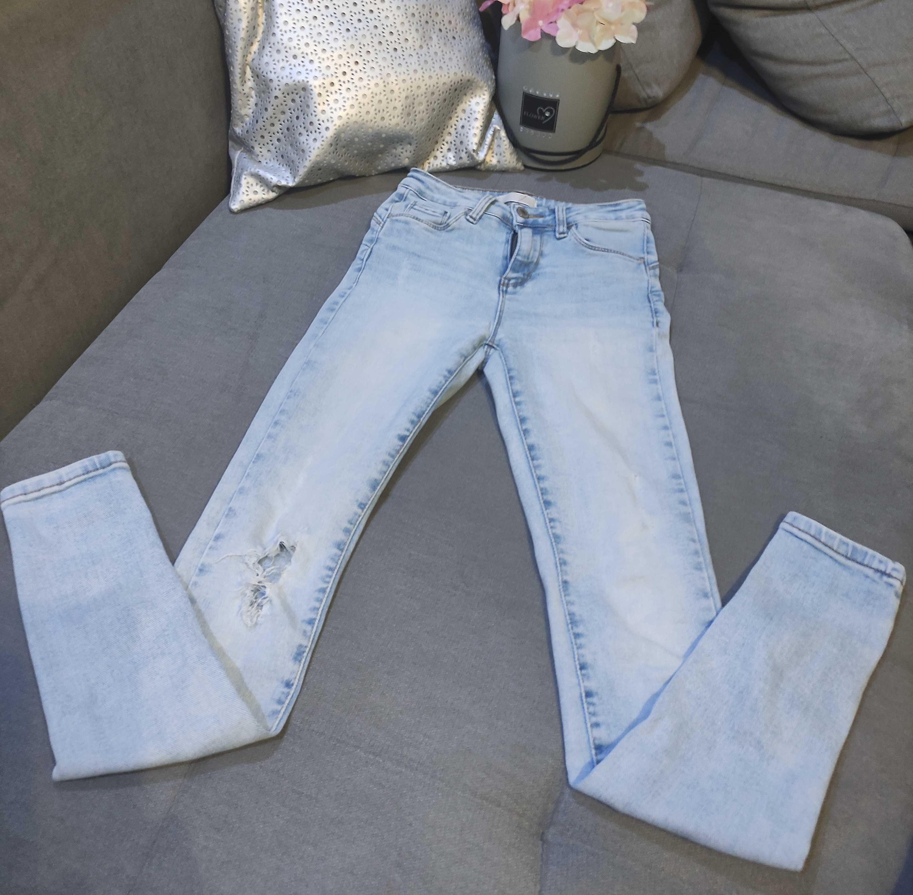 Spodnie jeansy dziury przetarcia jasne goodies XS dopasowane