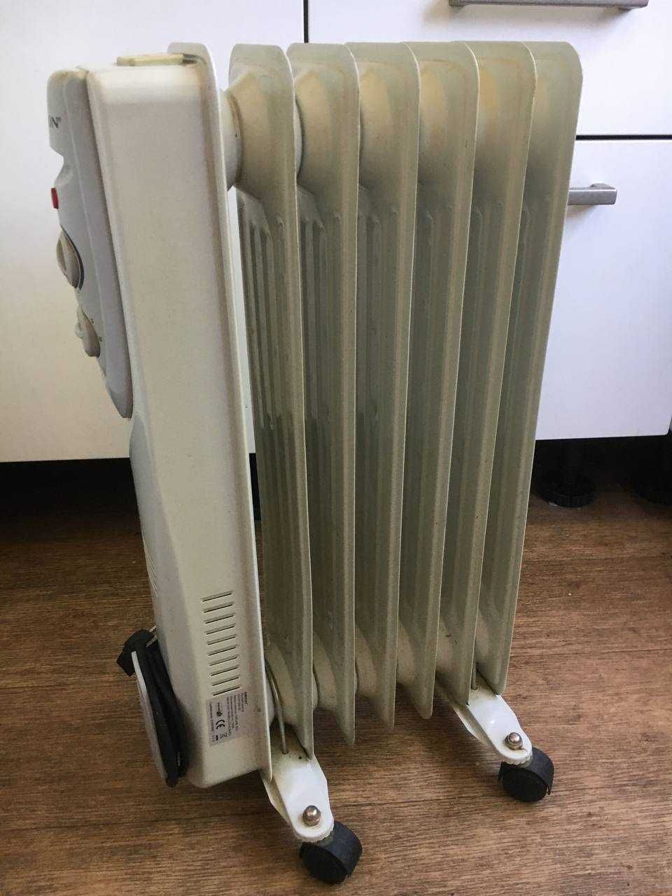 Обогреватель масляный.