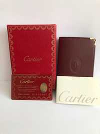 Oryginalny portfel skórzany Cartier nowy nieużywany, komplet