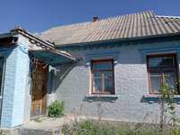 Продам будинок з великим городом, що спускається до річки