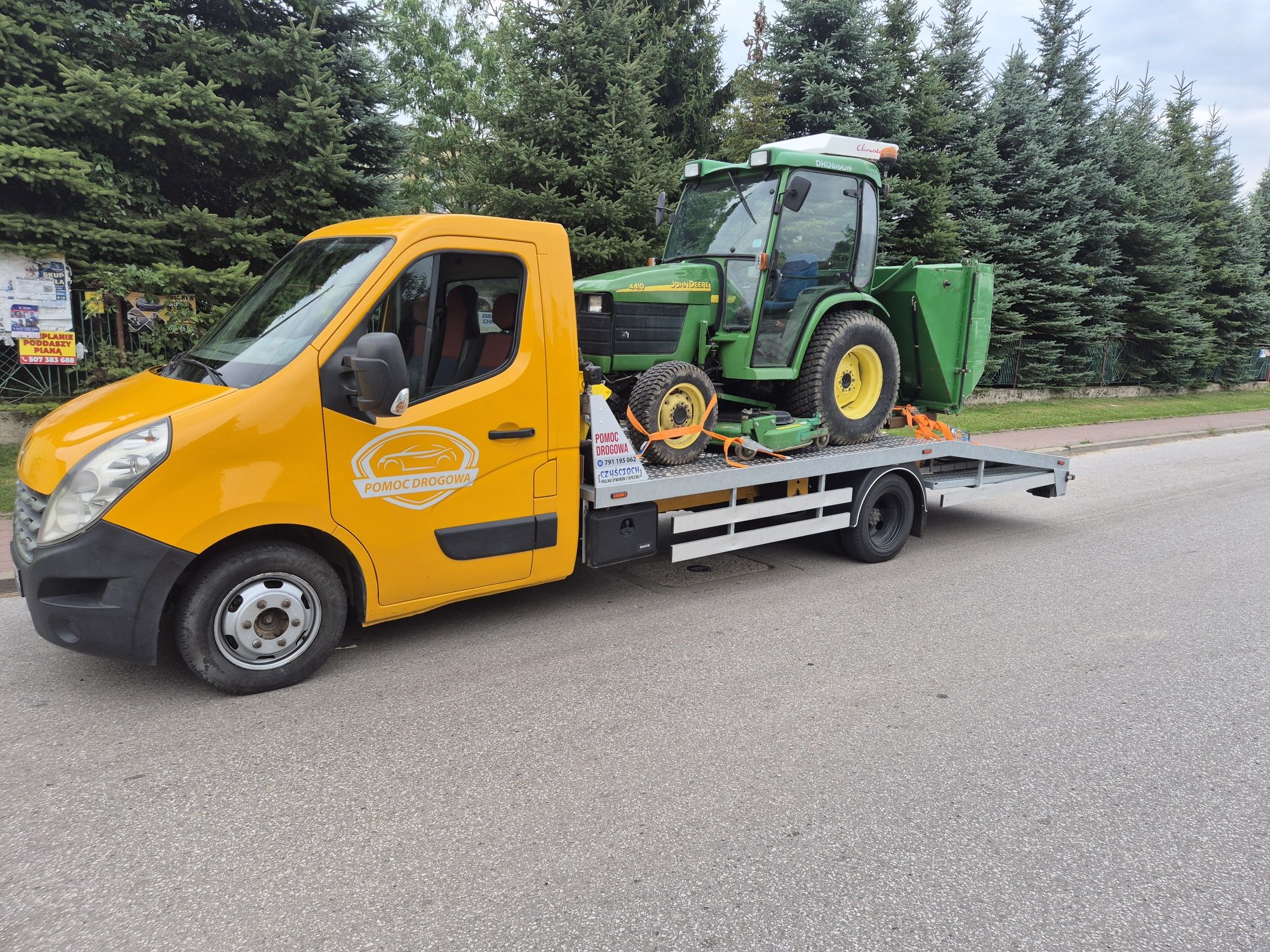 Pomoc drogowa holowanie autolaweta transport aut transport koparek