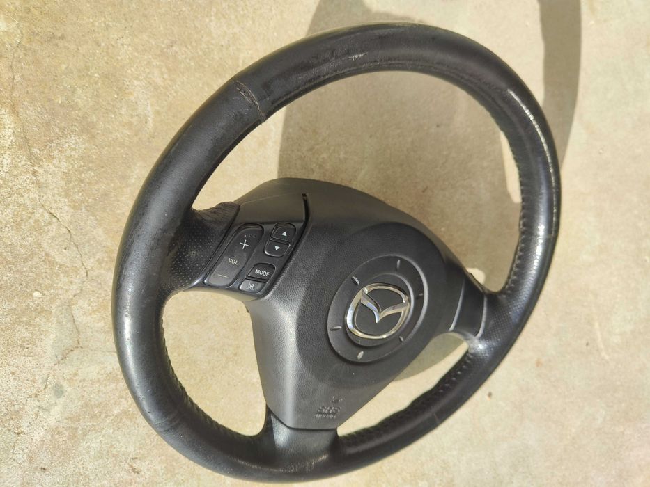 Volante Mazda Pele