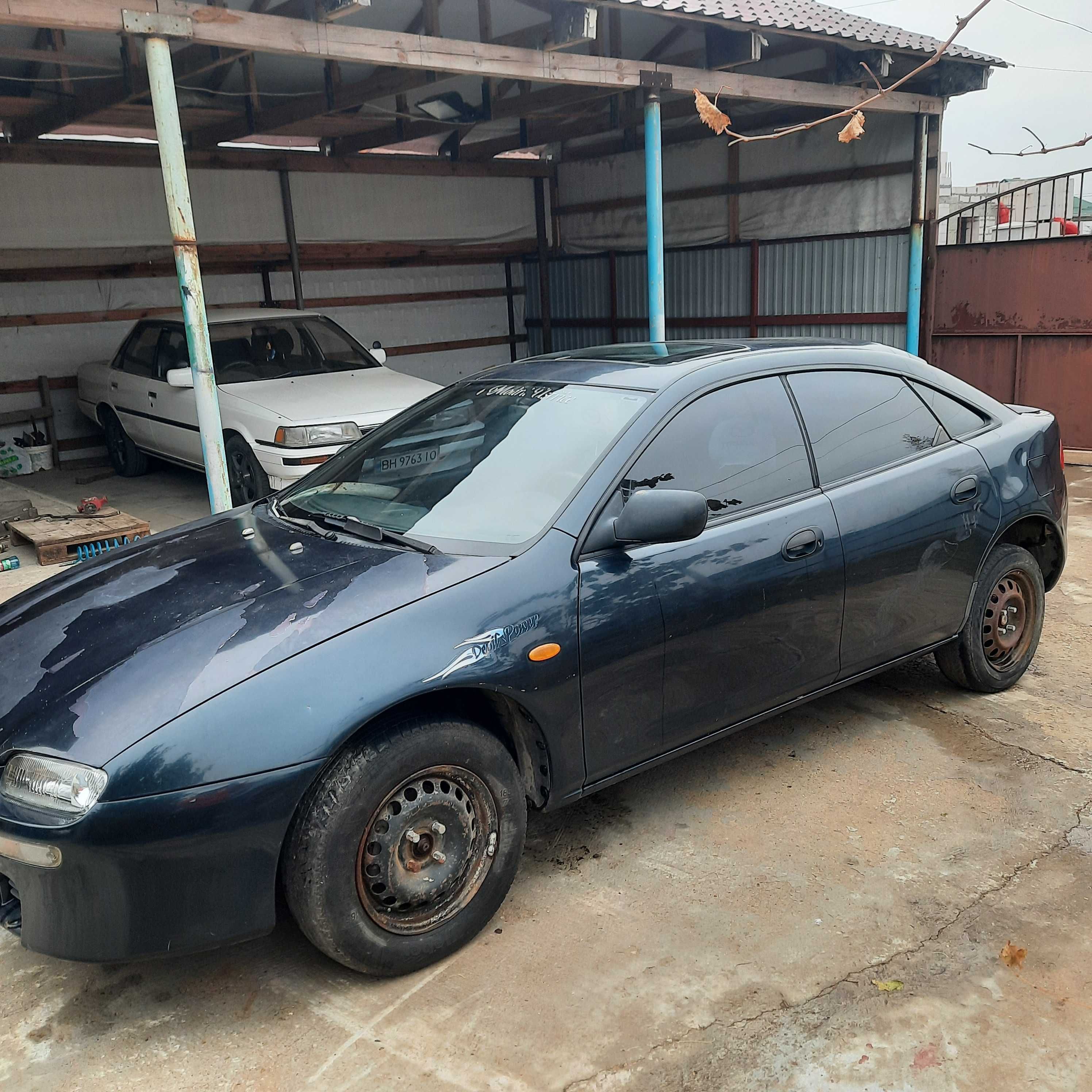 Розборка на запчасти мазда323f 1997г