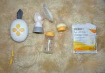 Двухфазный электрический молокоотсос Medela Solo + смартсоска и пакеты