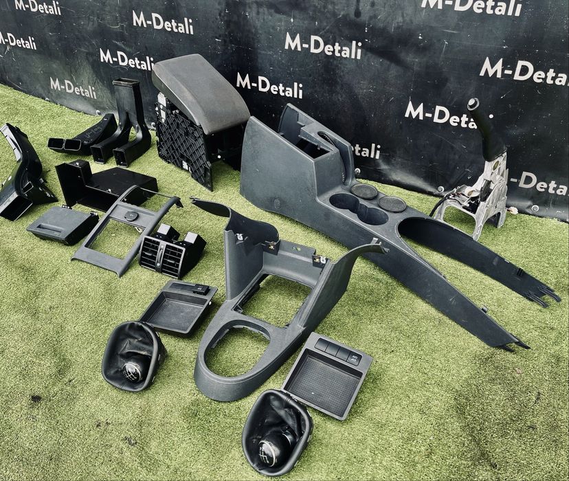 Передня консоль Тоуран підлокітник консоль Touran Caddy підстаканик VW