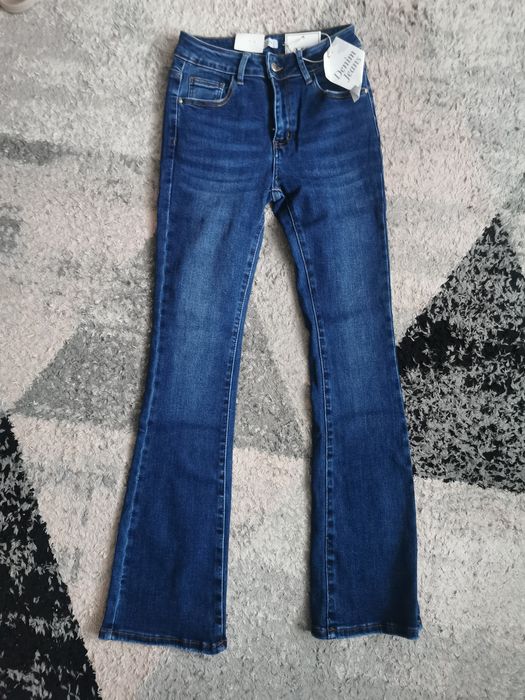 Spodnie jeans dzwony M nowe wyszczuplające