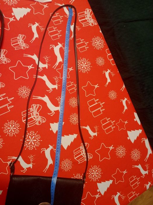 Torebka kopertówka na długim pasku