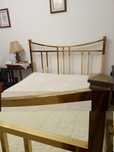 Cama antiga de latão