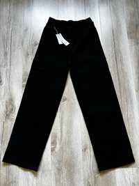 Spodnie czarne damskie dzwony z kieszeniami na gumce, rozmiar L/XL