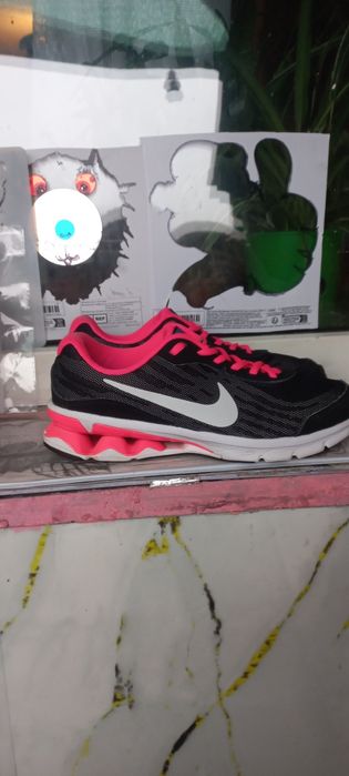 Женские кроссовки фирмы "NIKE Reax Run 9 "