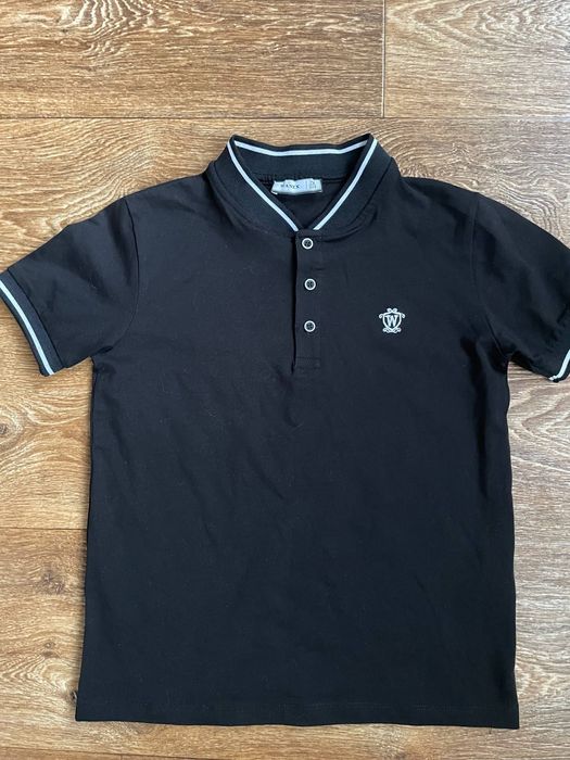 Продам футболку поло у гарному стані одягалясь один раз