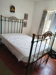 Cama antiga de ferro