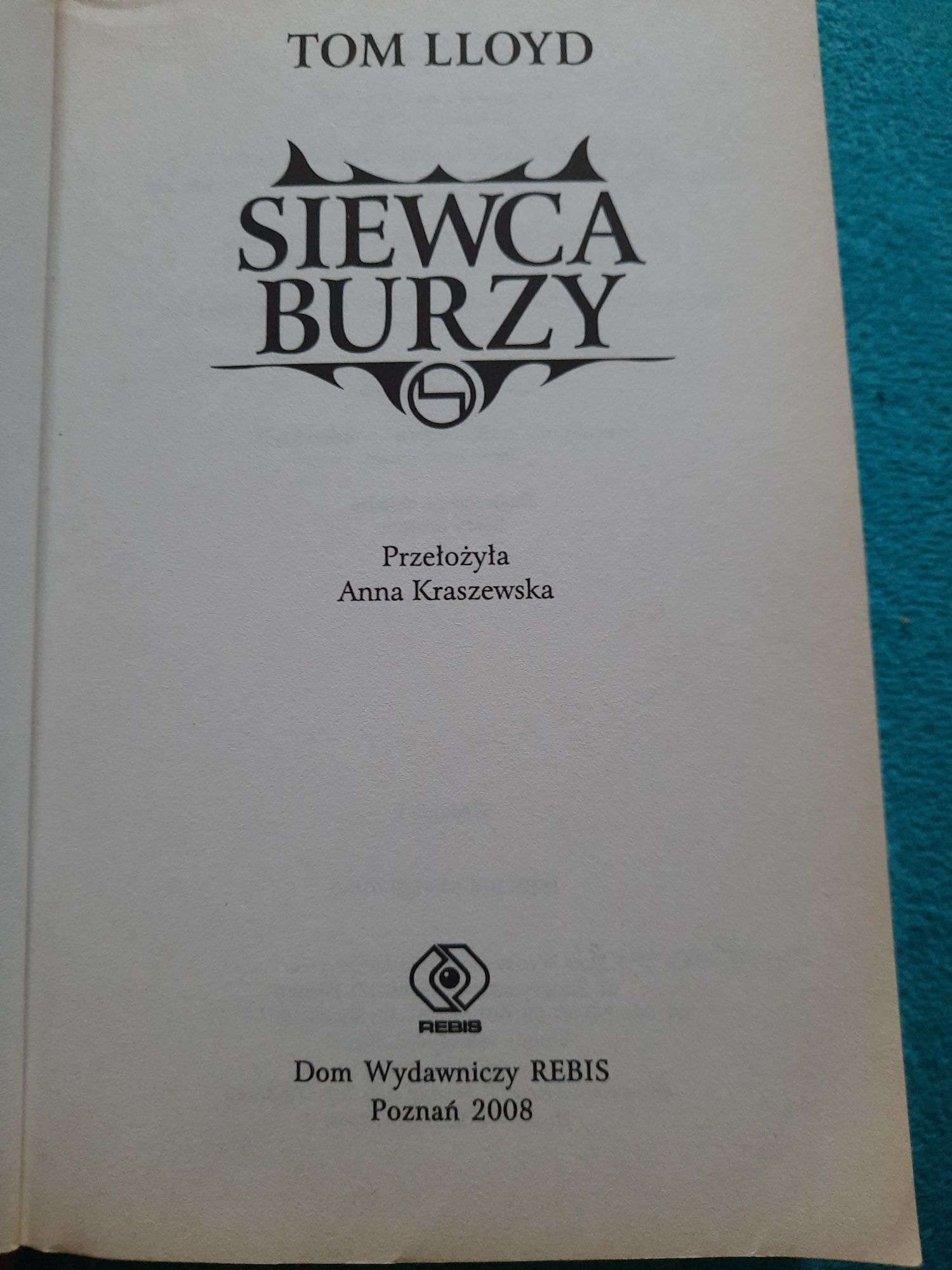 Tom Lloyd Siewca Burzy 1 tom z cyklu Królestwo Zmierzchu Rebis