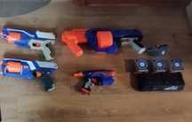 4 pistolety Nerf + okulary + cel elektroniczny +strzałki