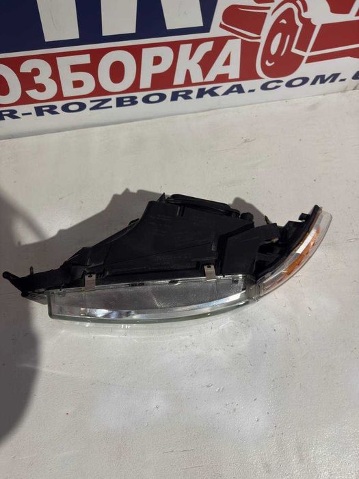 Фара головна SCANIA P/G/R/T >2003 ручне УПРАВ. ЛІВ. 2416124