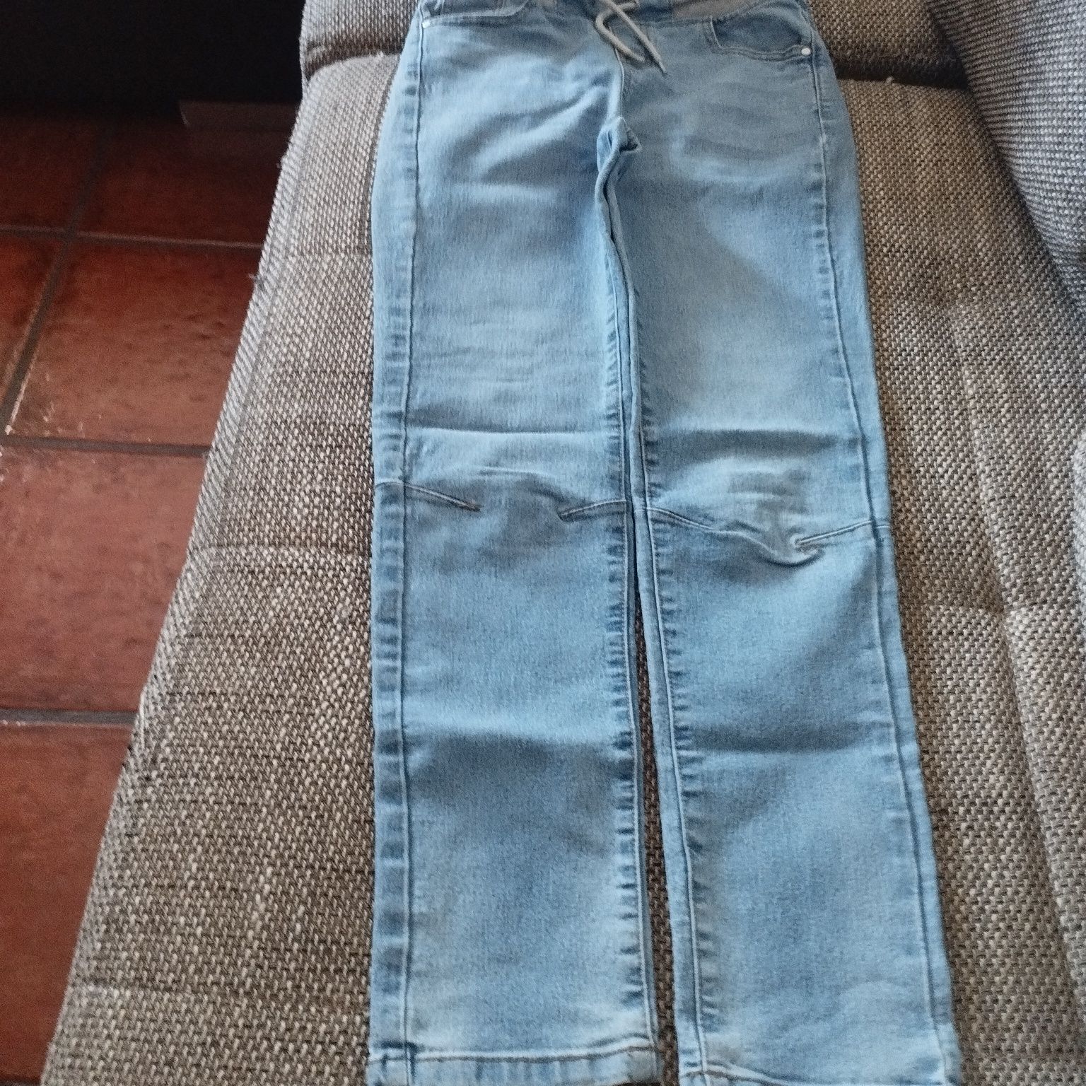 Roupa de rapaz como nova