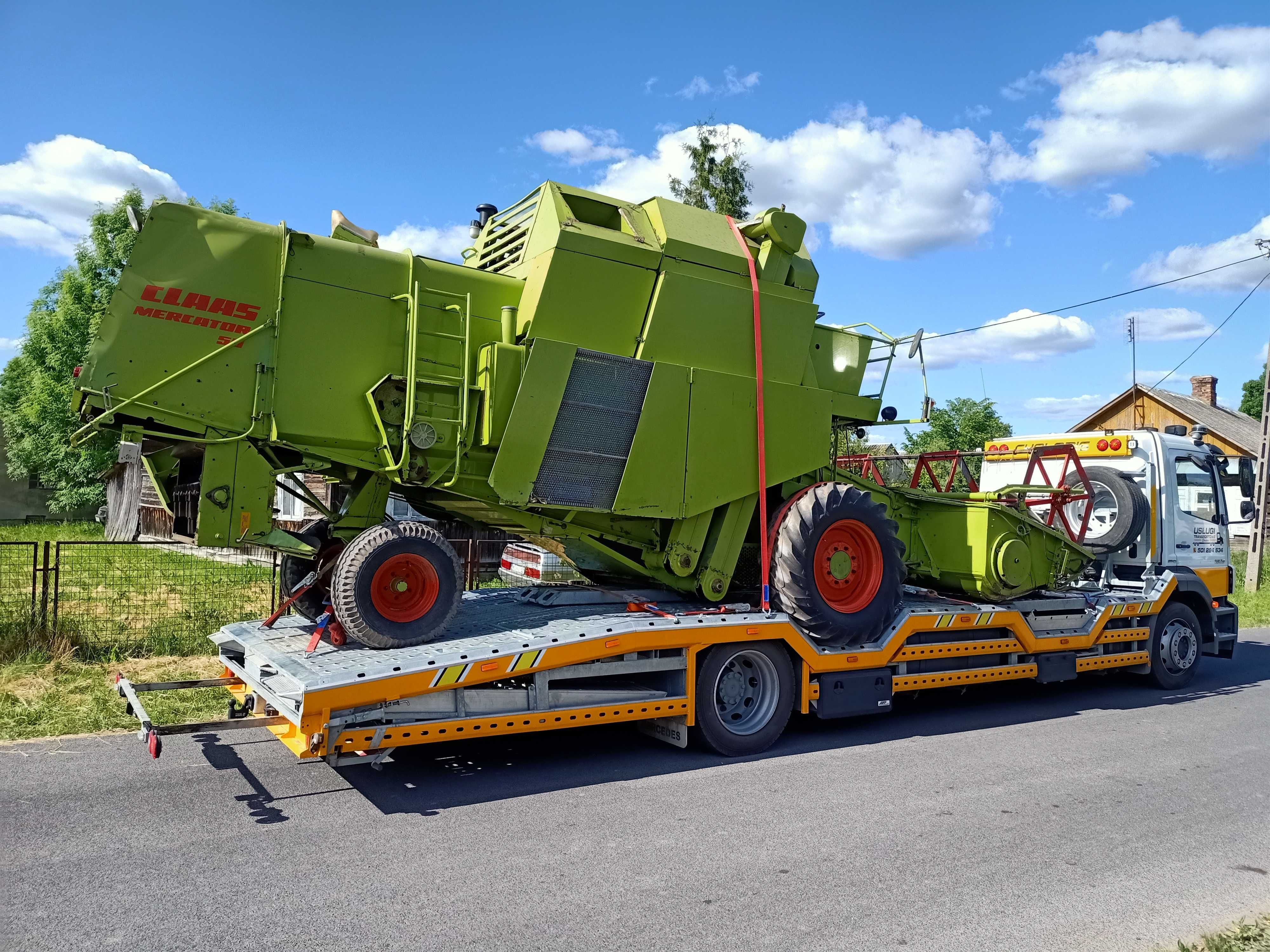 Pomoc drogowa transport maszyn  laweta autolaweta usługi transportowe