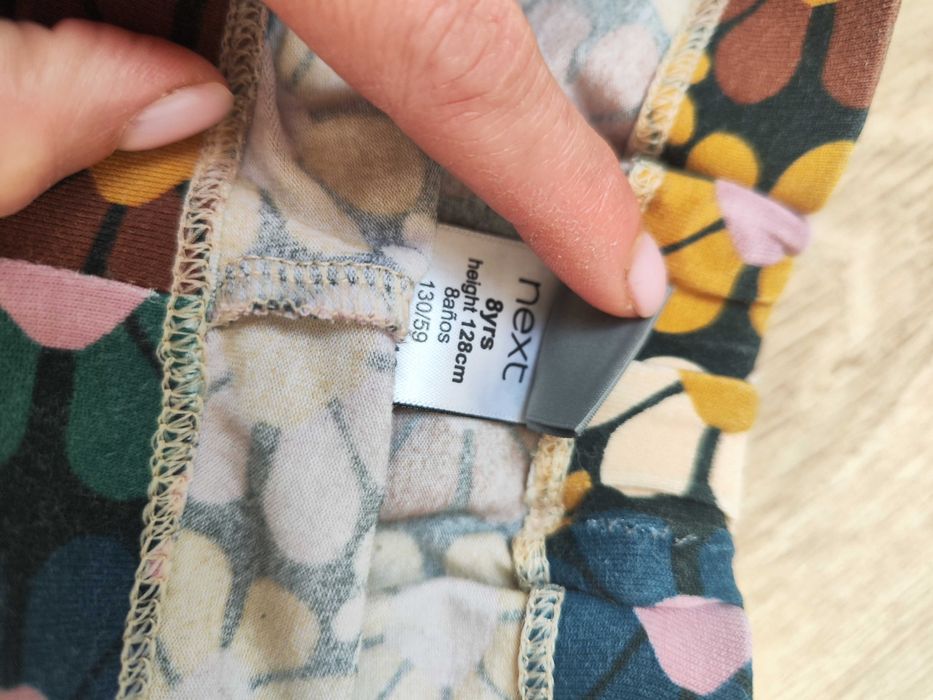 Next legginsy jesienne 128 kwiaty rude zielone długie elastyczne