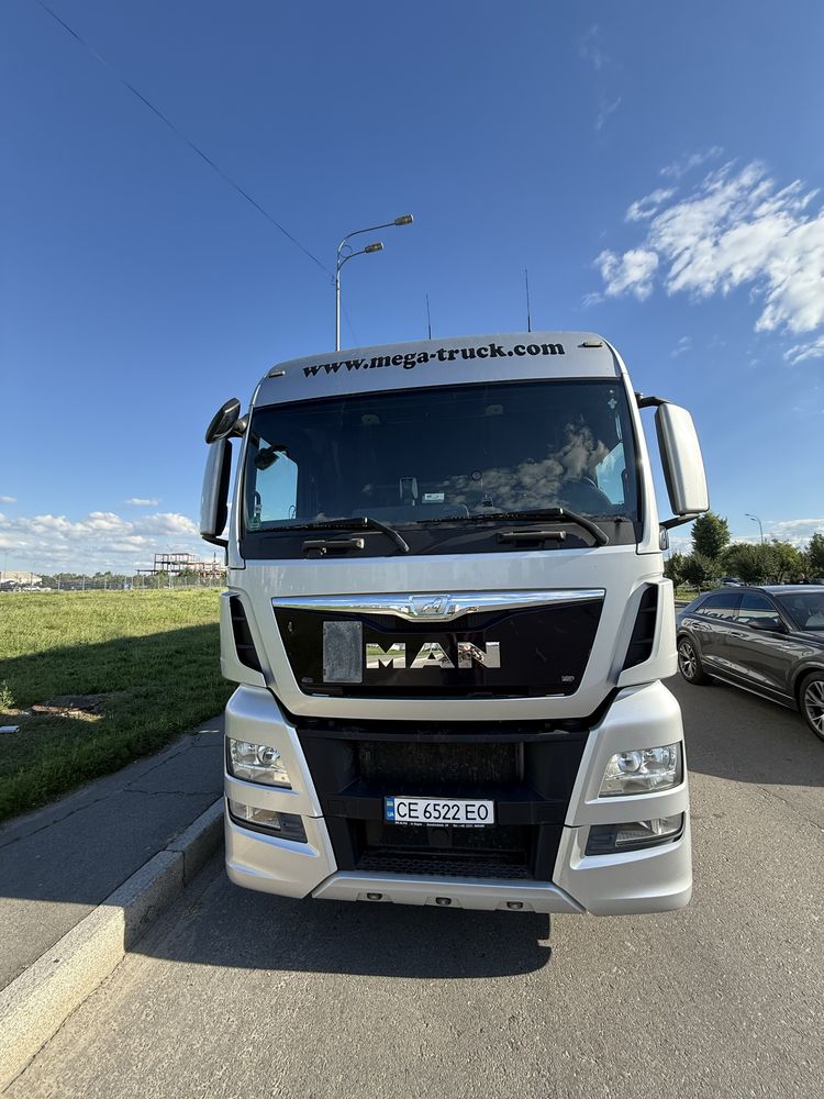 MAN TGX 18.440 Евро 6 2014 р.Причіп SCHMITZ