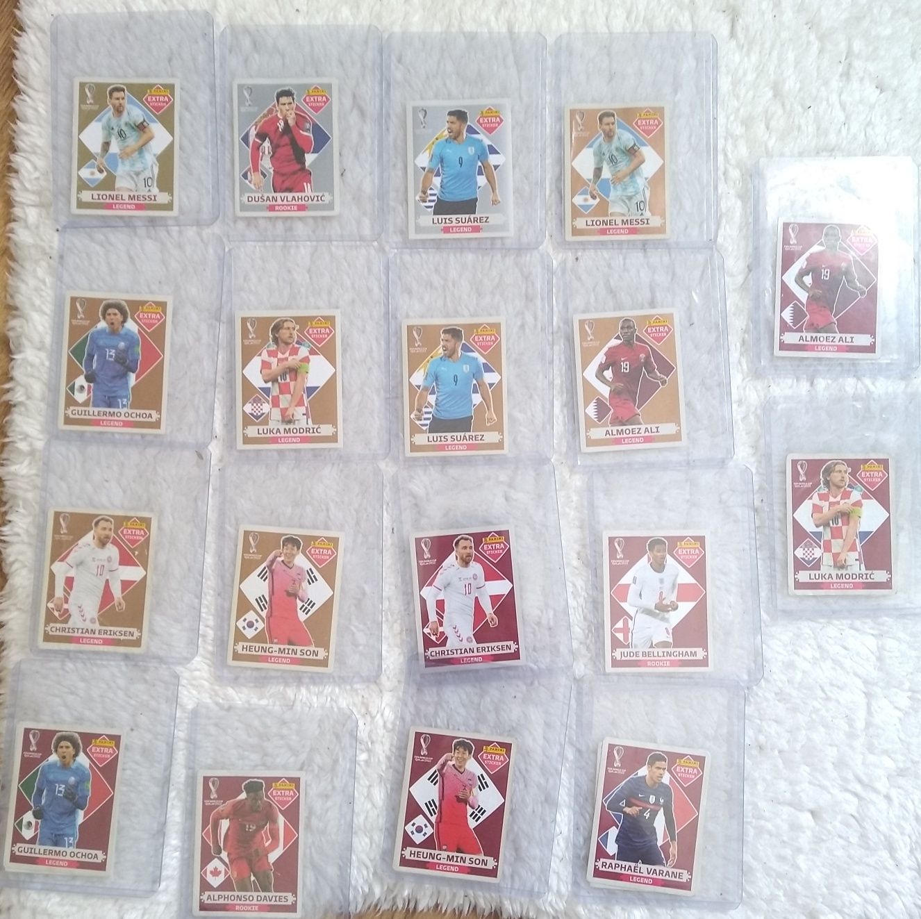 Cromos mundial FIFA 2022 Messi Modric Eriksen Son Suarez Ochoa Vlaovic