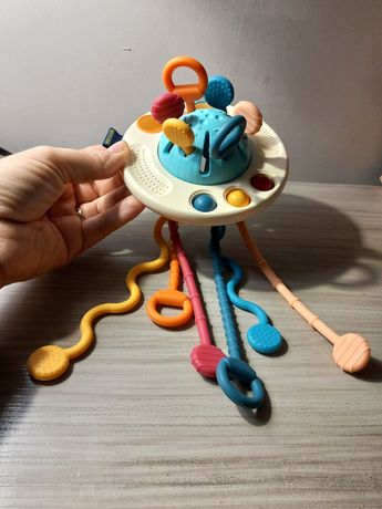 Дитячий прорізувач, тягнучка, сенсорна іграшка