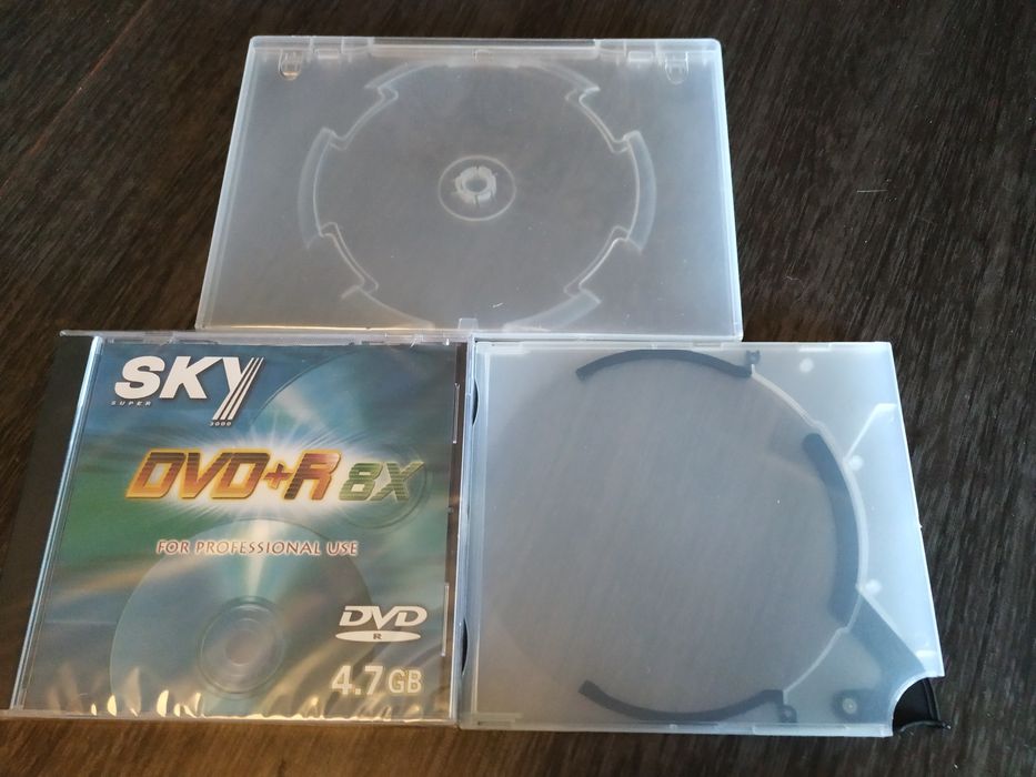 DVD-R novo (nunca aberto) + 43 Caixas arquivadoras de DVDs / CDs