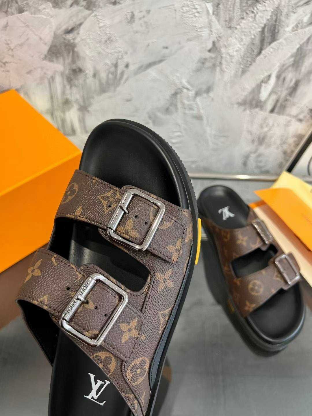 Louis Vuitton Buty, sandaly klapki, skora  od reki nowe