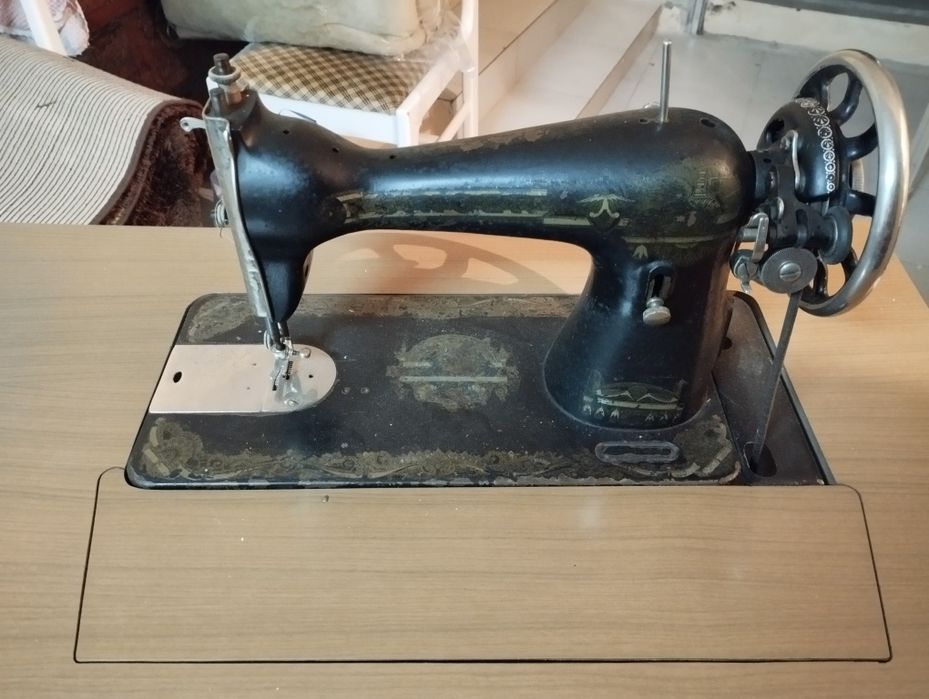 Máquina de costura antiga Singer