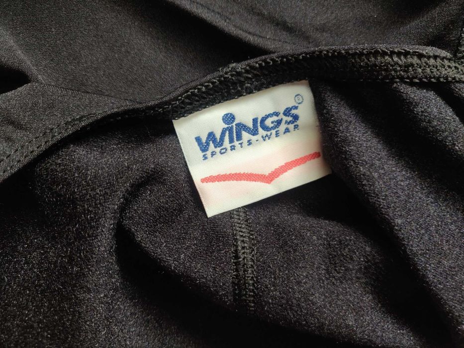Спортивный  комбинезон Wings  sport wear Xl (Holland) черного цвета.