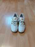 Buty piłkarskie Adidas Traxion Turf białozłote