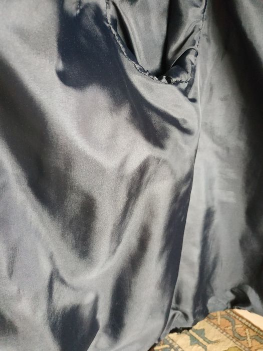 Casaco de pele genuíno Astrakan com gola em vison