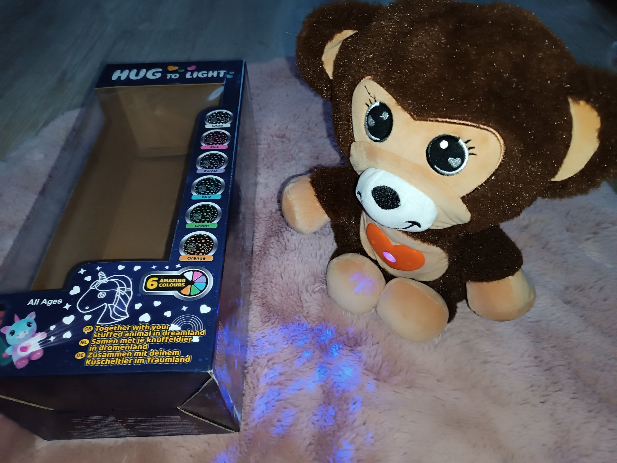 Świecący miś z projektorem pluszowy Hug to light