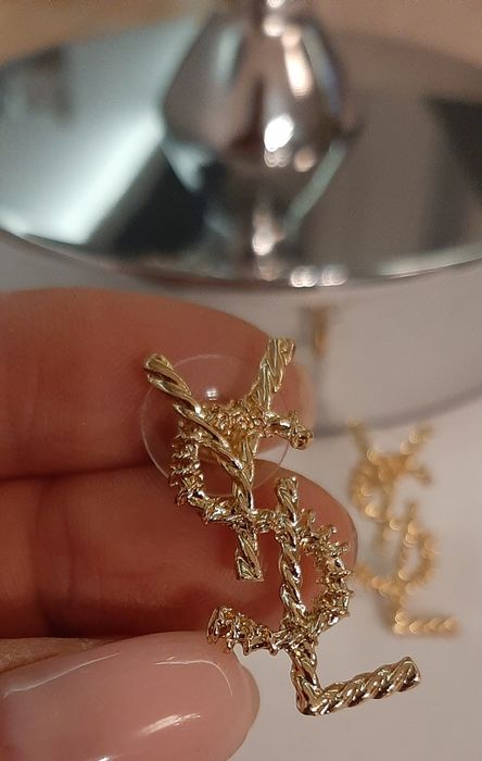 Duże, pozłacane kolczyki ysl model Opyum Cudo lv cc