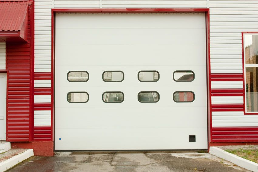 Автоматические секционные гаражные,промышленные и въездные ворота.
